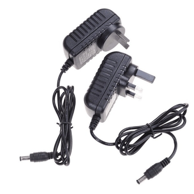 Συνεχή 9V 1A / 2A Συστασία τροφοδοσίας 9W 1000mA UK Plug Adapter Τύπος εξόδου DC 5,5 mm x 2,1 mm EU Plug