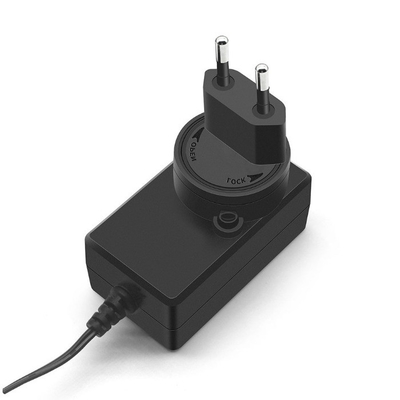 Αποτελεσματικότητα 85% Μαύρο C-Power Παγκόσμιος προσαρμογός ισχύος με 12V 2A 24W AC100-240V
