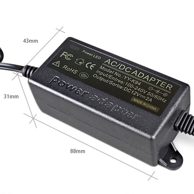 Μαύρο C-Power AC100-240V DC 12V 2A Δυναμικό προσαρμογέα 12V για την ΕΕ AU UK US
